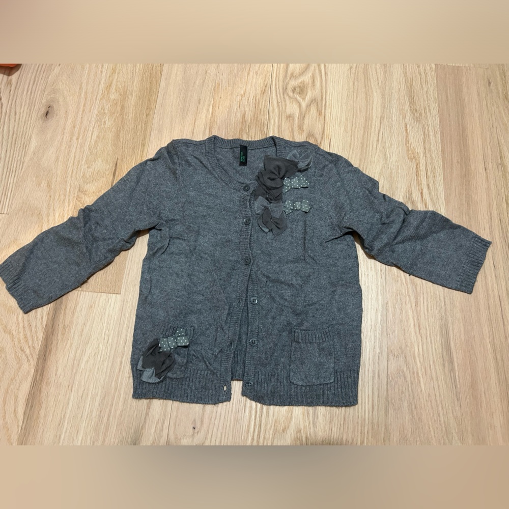 Benetton girl cardigan.